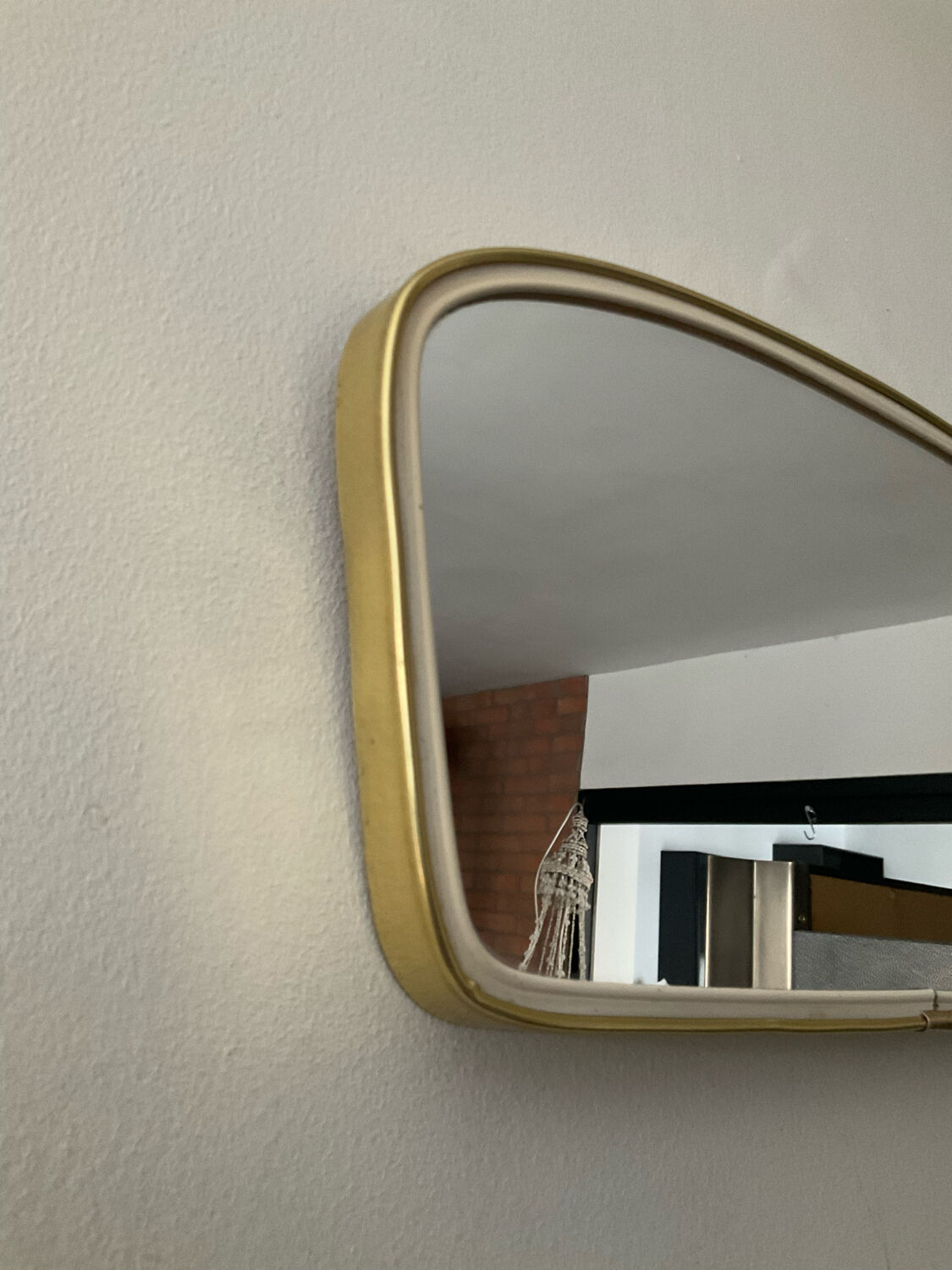Asymmetrical mirror mirror from the 60s and 70s