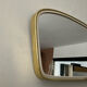 Asymmetrical mirror mirror from the 60s and 70s
