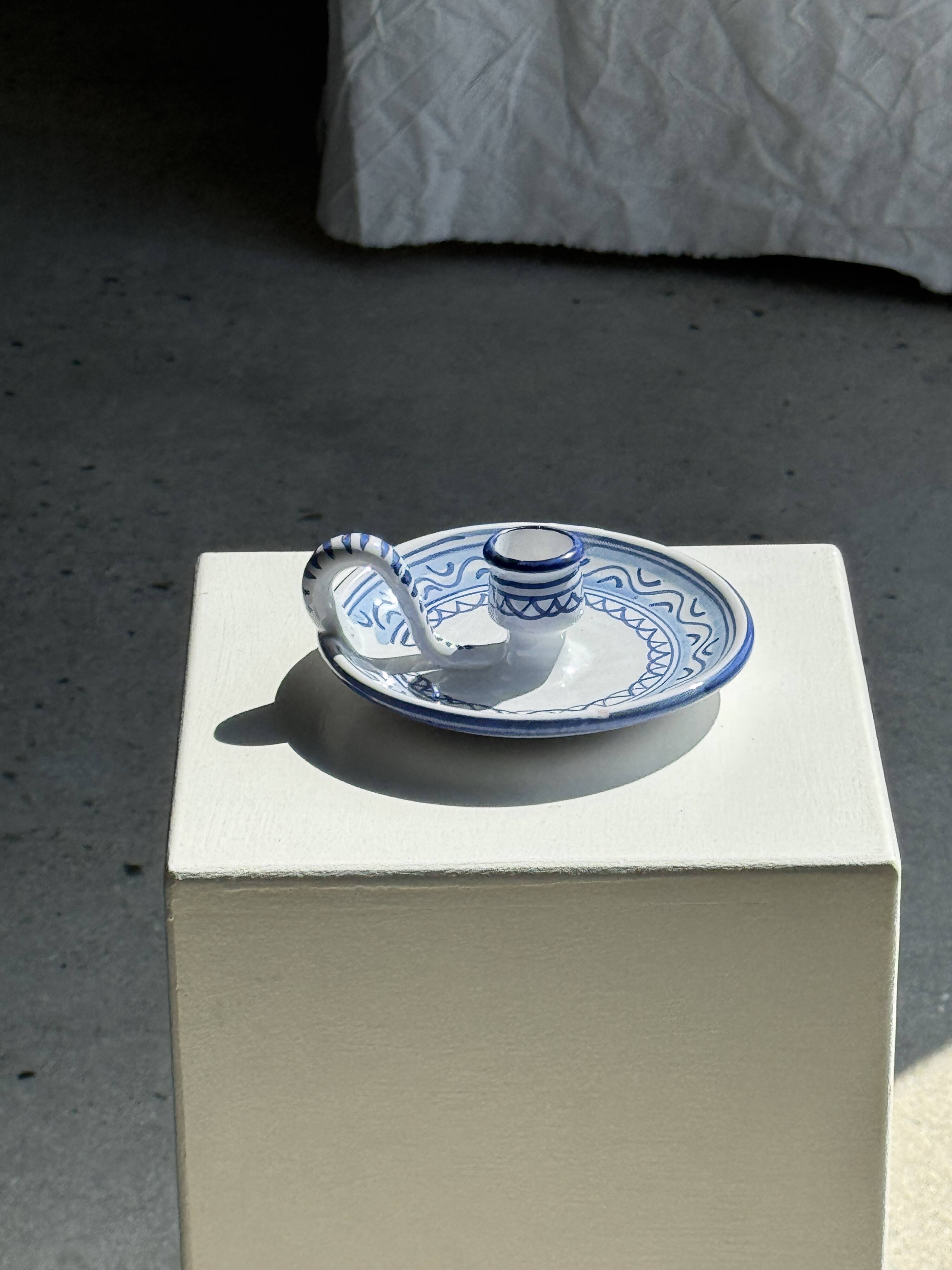 Small handmade white candle holder with blue geometric frieze pattern H7