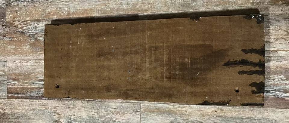 Central Africa 20th century: carved wooden panel in bas-relief of elephants