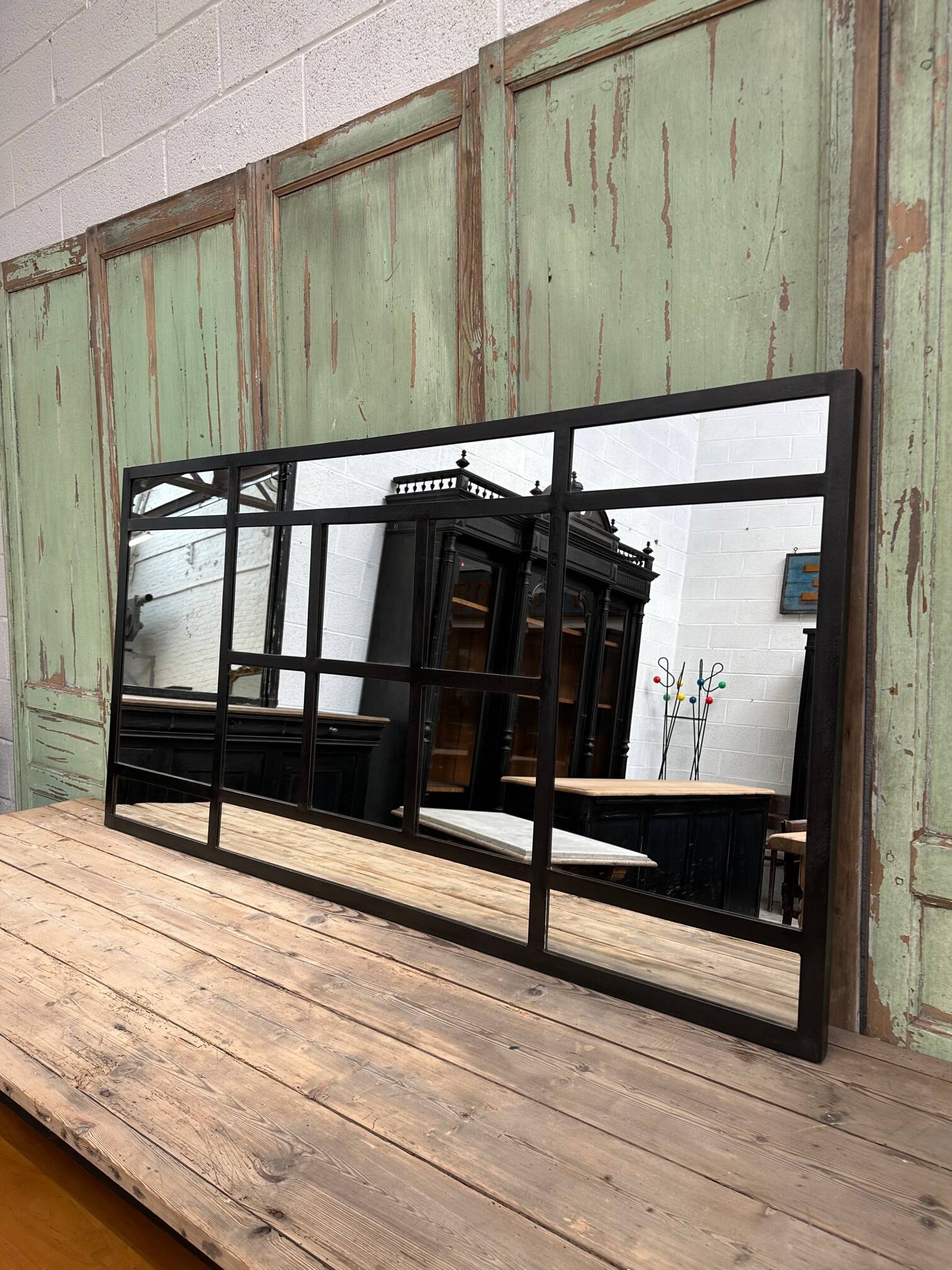 Large metal mirror