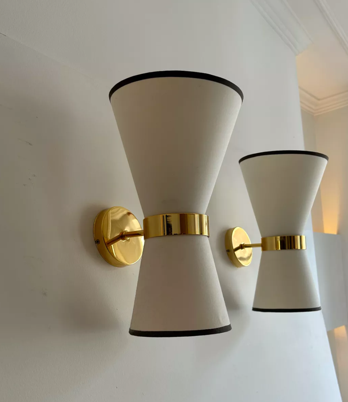Pair of vintage wall lamps, solid brass and unbleached fabric, Italy 1980