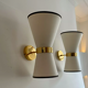 Pair of vintage wall lamps, solid brass and unbleached fabric, Italy 1980