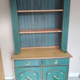 Rustic dresser with floral decor