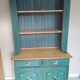 Rustic dresser with floral decor