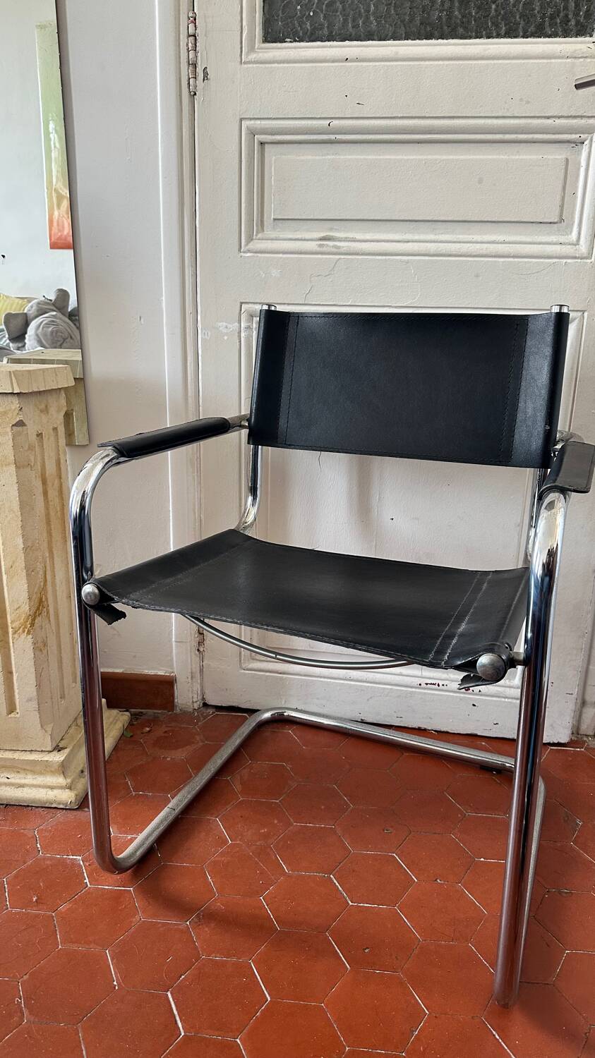 Vintage design armchair in leather and metal