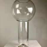 A modernist vase in clear glass.