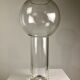 A modernist vase in clear glass.
