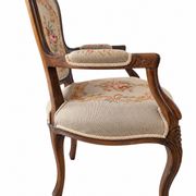 Louis XV style carved wooden armchair with floral needlepoint upholste