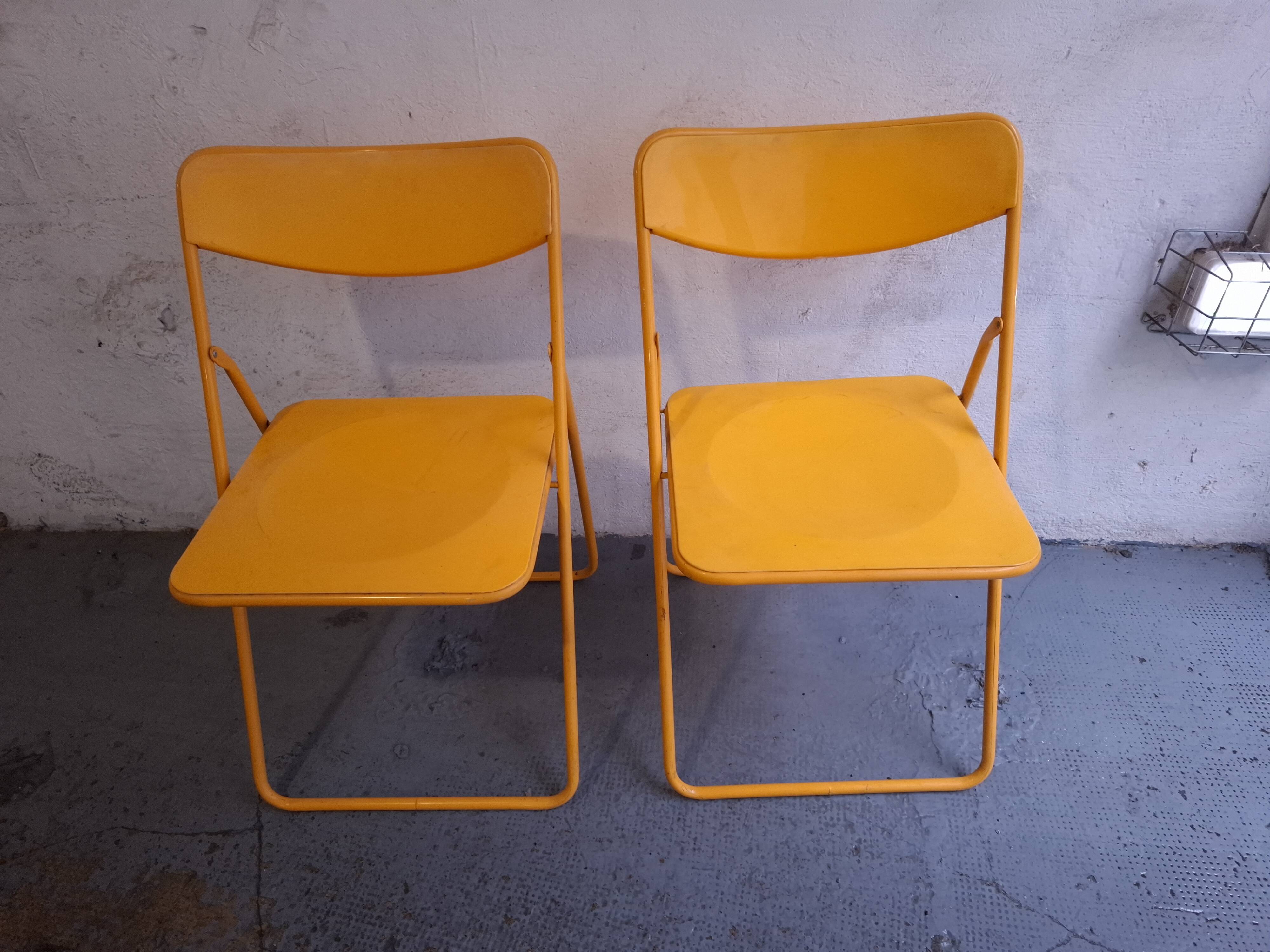 Two ikea folding chairs, niels gammelgaard