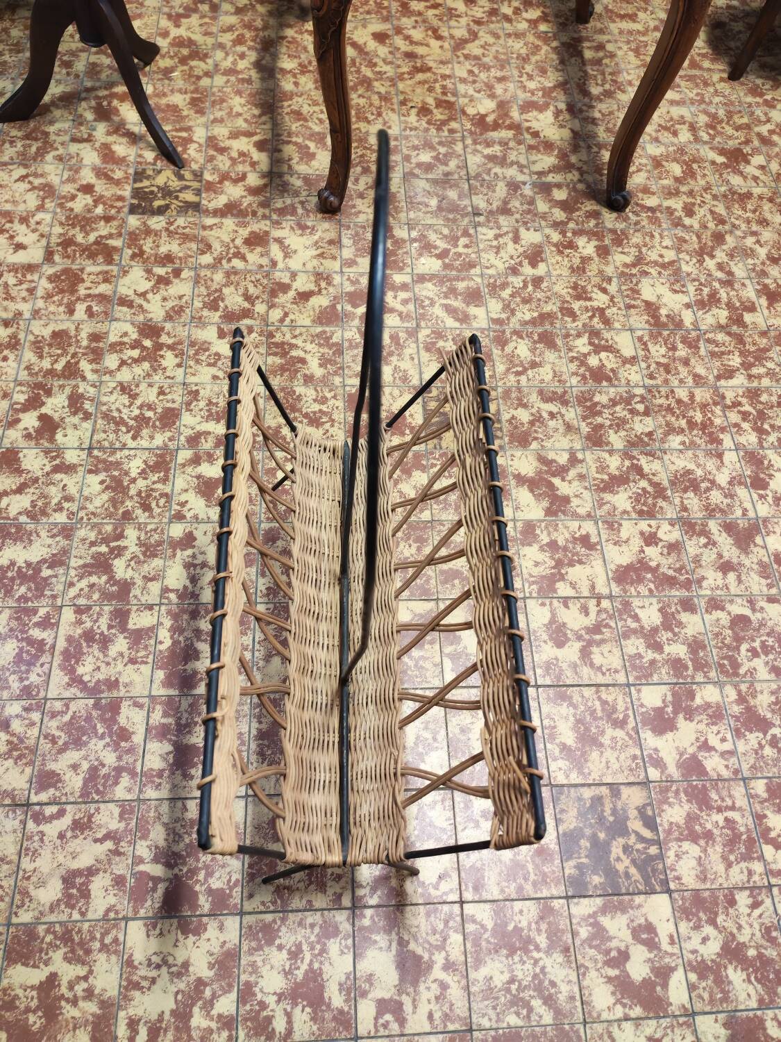 Metal and wicker magazine rack