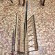 Metal and wicker magazine rack
