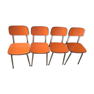 Lot of 4 vintage chairs in orange formica