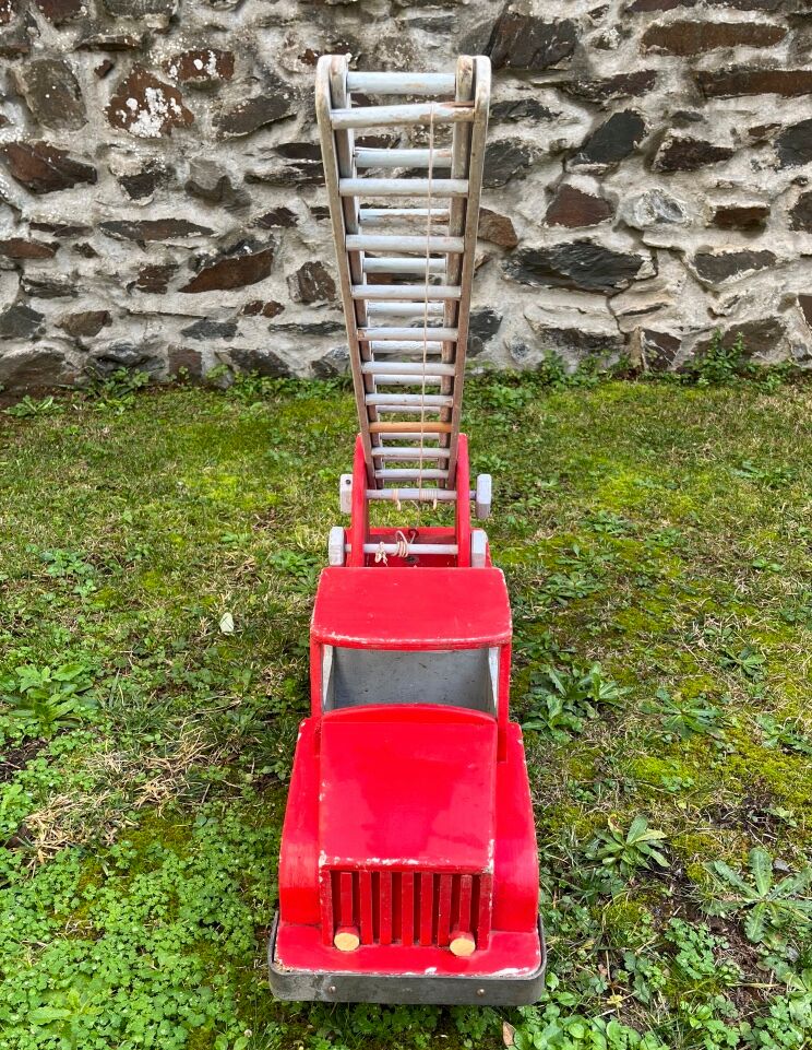 Fire truck with wooden ladder