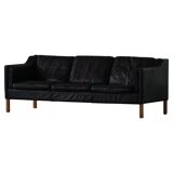 Three-seater canapé by Mogens Hansen, mid-century, in patinated black leather and solid beech.