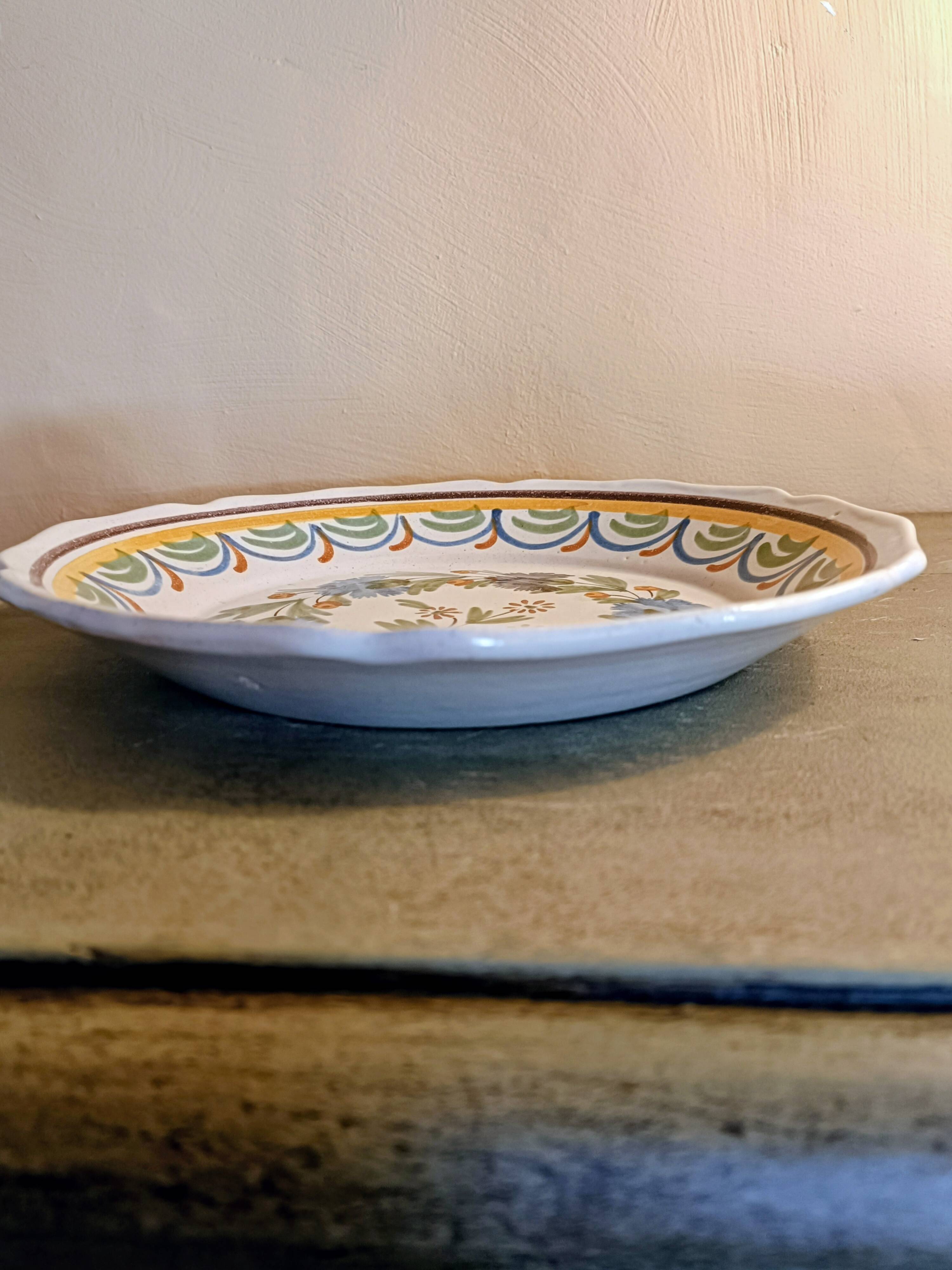 Antique hollow plate from Nevers pottery.