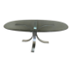 Table basse années 70 pied tulipe aluminium et verre fumé