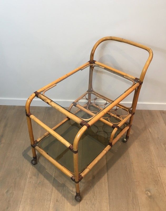 Rattan rolling table and leather ties