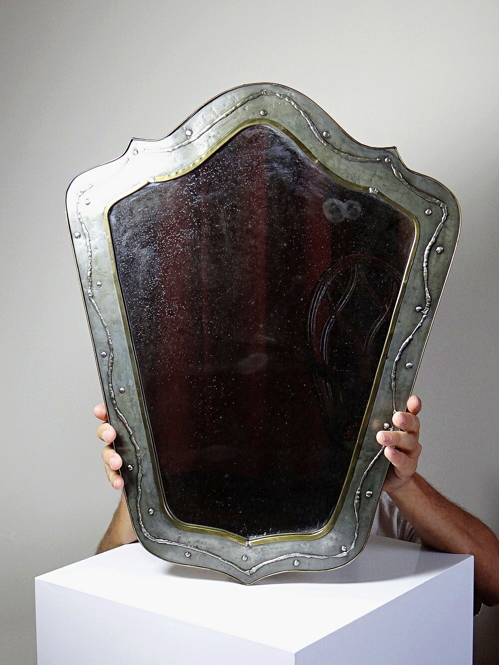 Brutalist mirror by Jean Goardère, brass and tin, 1970s.