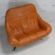 Sofa "space age". Leather, fiberglass, foam, steel. Circa 1970. Orange.
