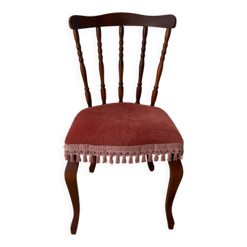 Wooden chair with red velvet