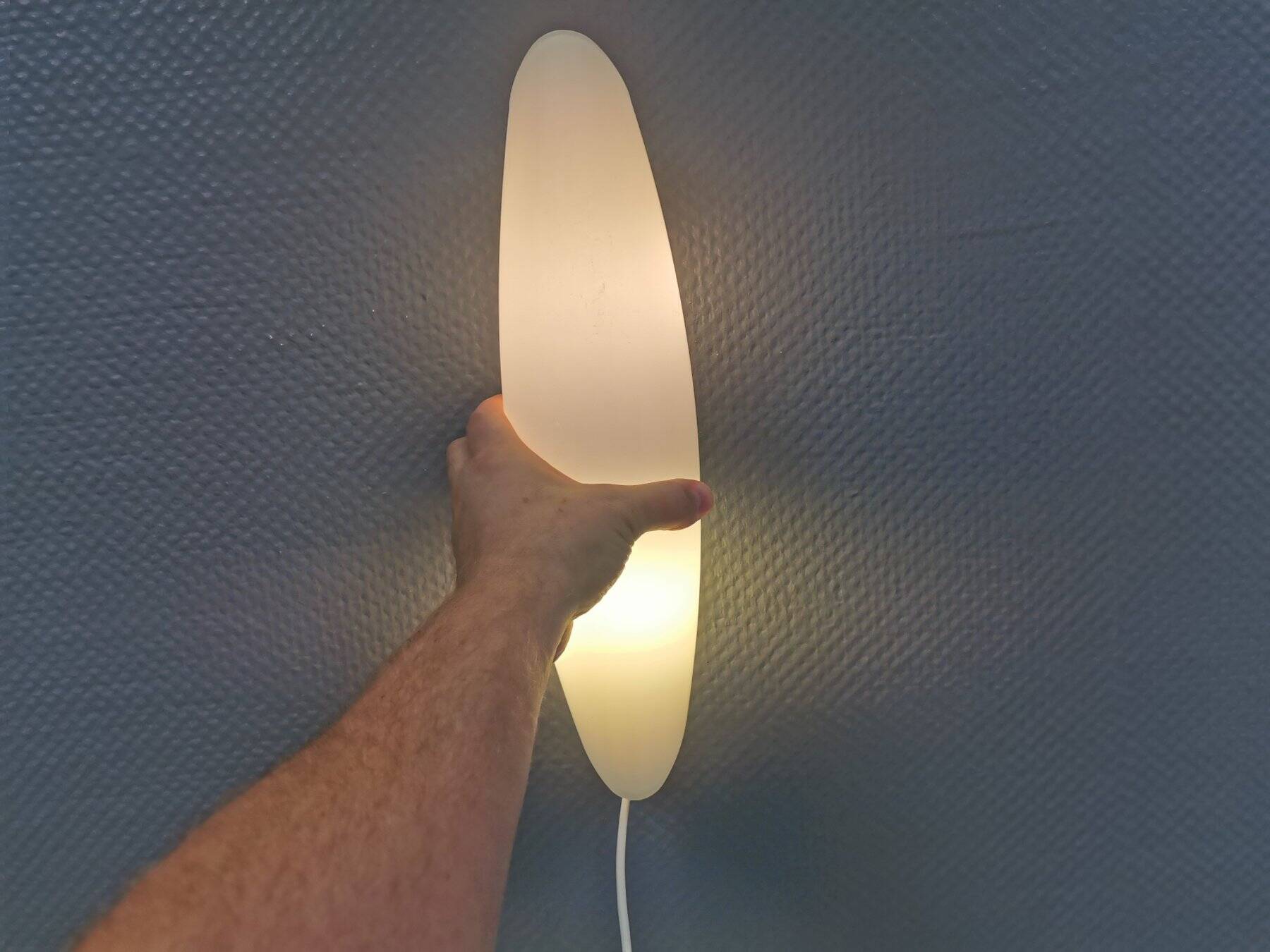 Wall lamp from Paulmann with white opal glass shade.