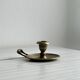 Brass candle holder with handle.