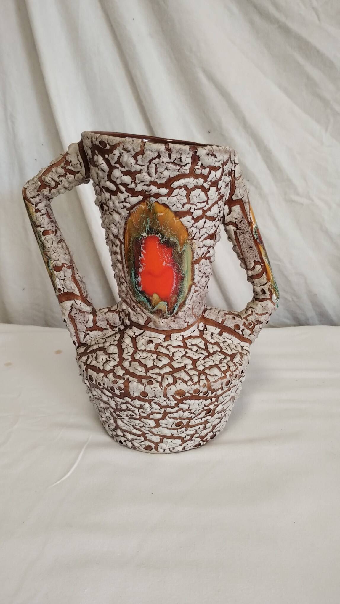 Cracked ceramic vase from the 70s