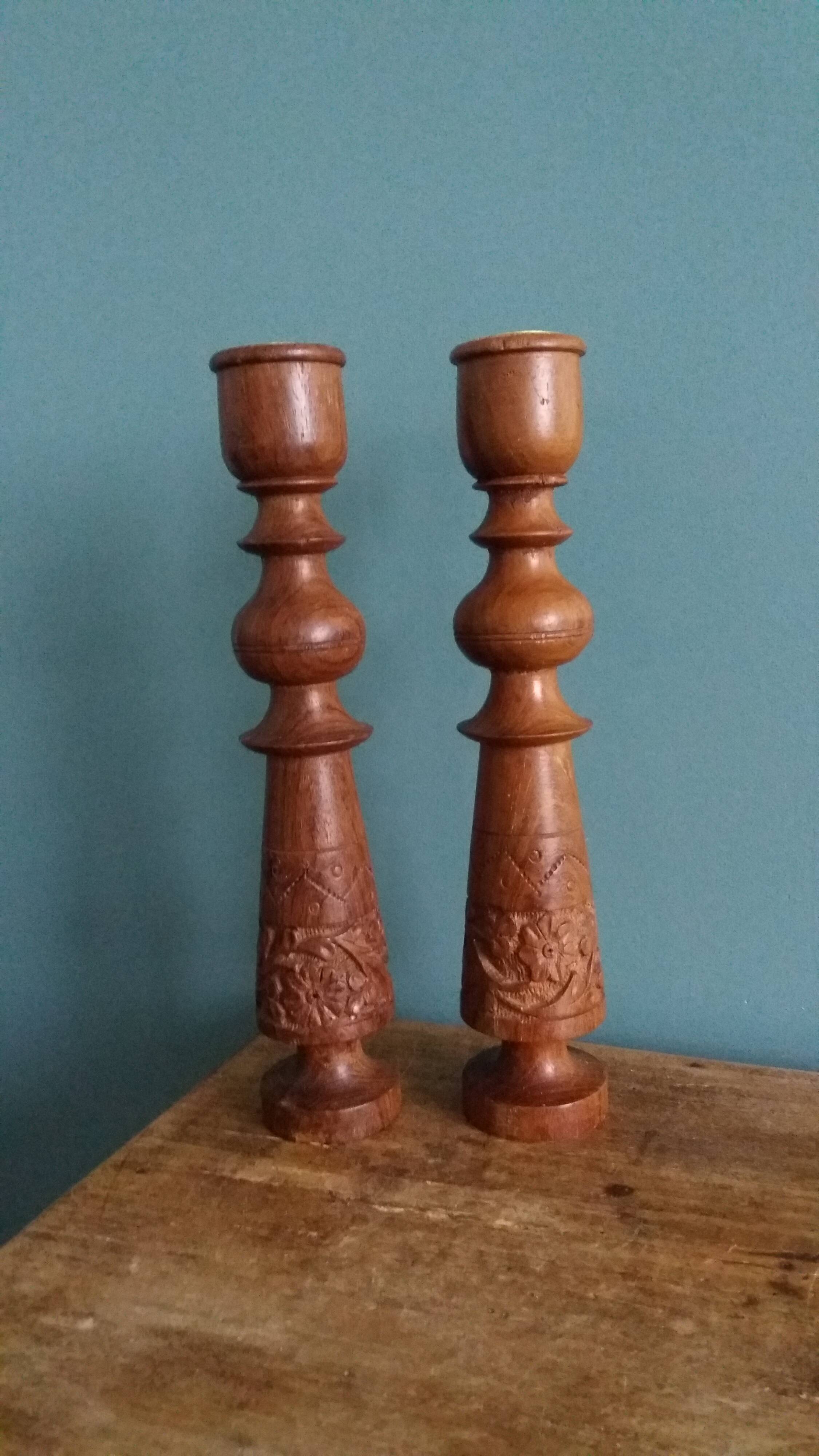 Bohemian candle holders made of turned and carved wood.