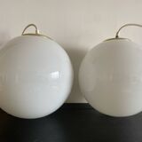 Pair of white Parscot globe pendant lights