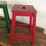 Three wooden stools with a handle