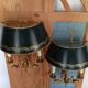Pair of bronze and sheet metal hot water bottle wall lights