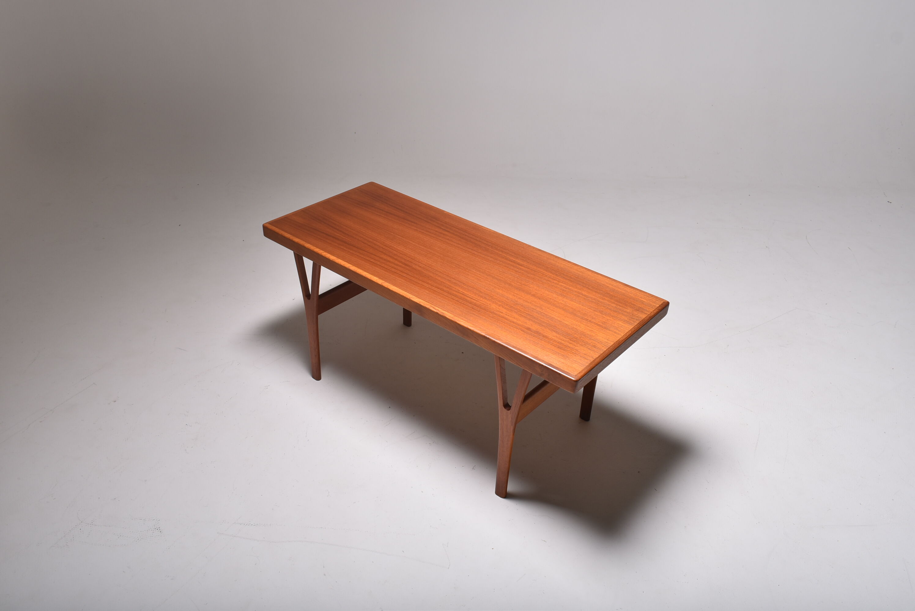 Scandinavian coffee table Trioh in teak