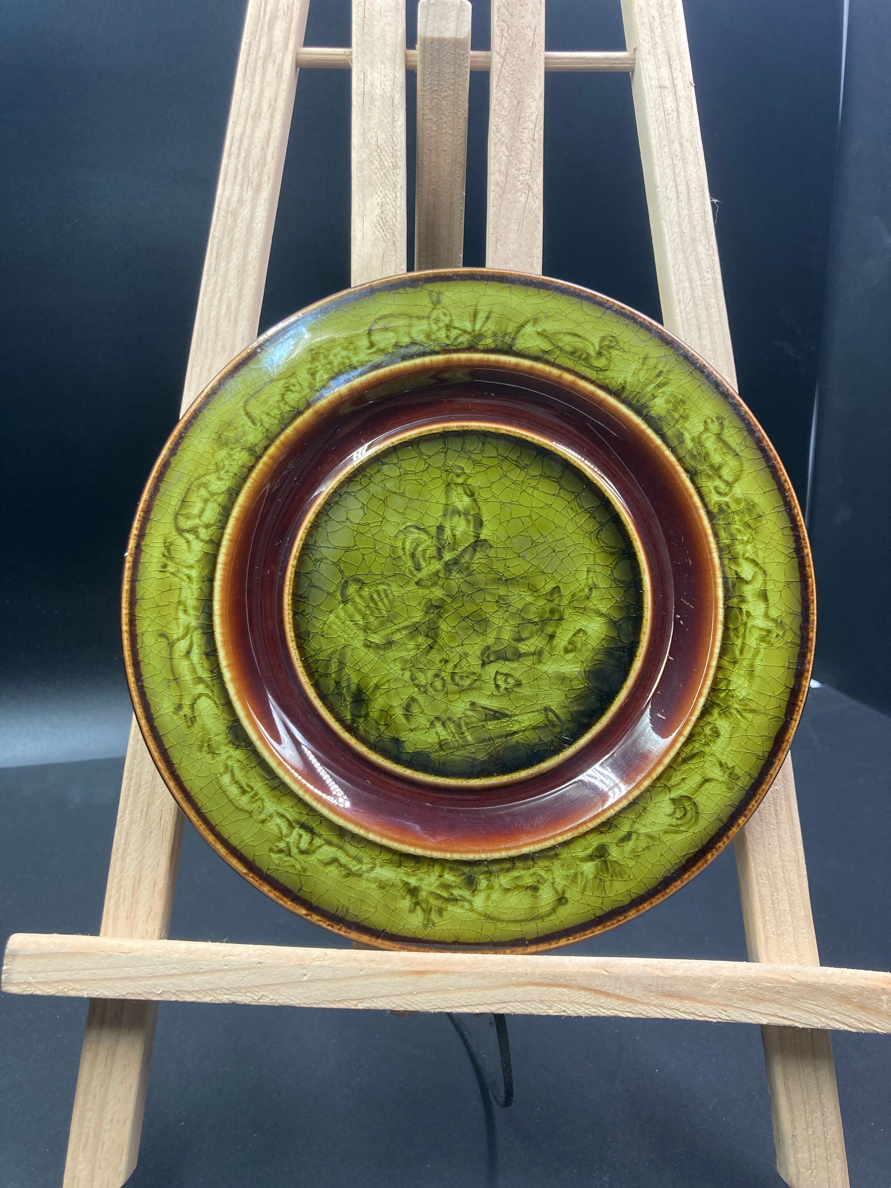 Two faience plates enamelled with choisy le roi HB & cie