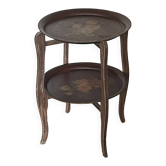 Two old trays on a stand/console.