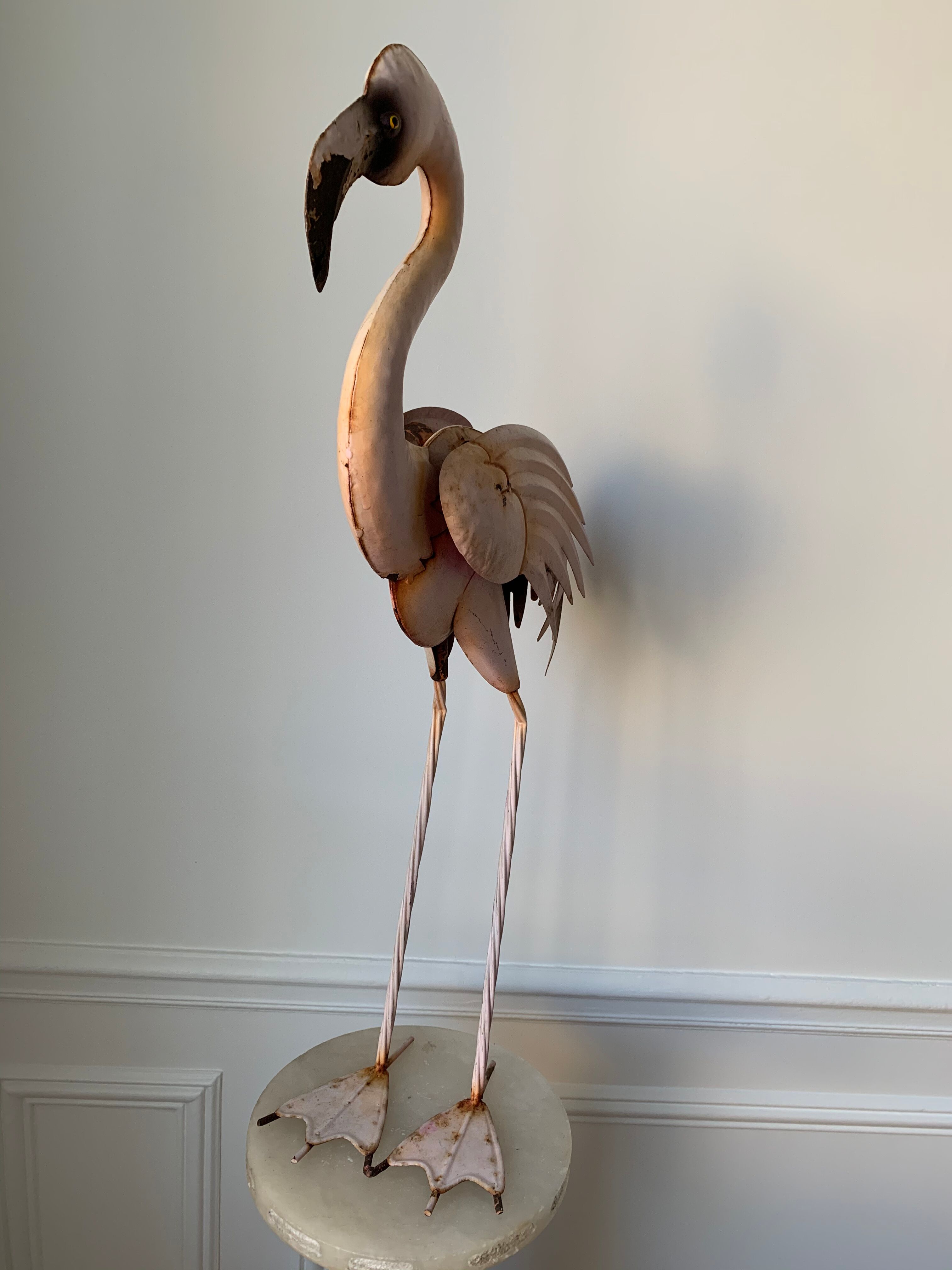 Old decorative pink flame in painted metal