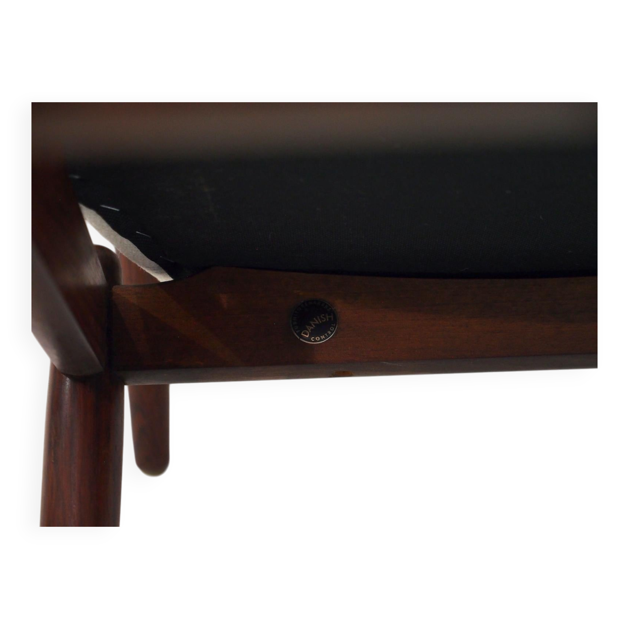 Set of six hardwood chairs by Arne Vodder for Sibast with white textile upholstery.