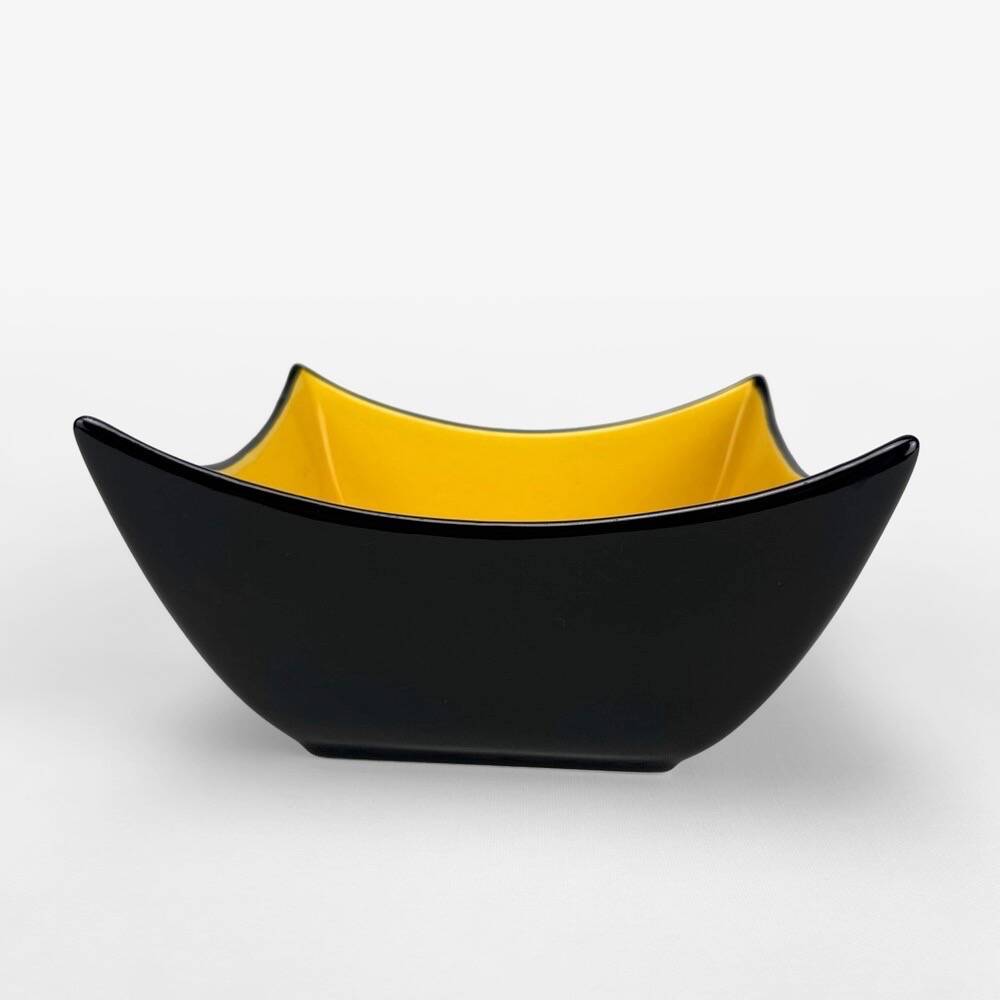 Mid-century black and yellow enameled ceramic bowl