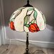 Perenz Tiffany style stained glass table lamp, brass, signed