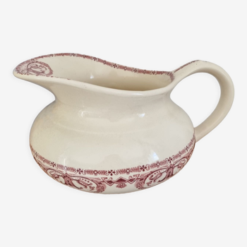 Red vintage toilet pitcher