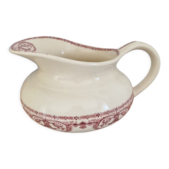 Red vintage toilet pitcher