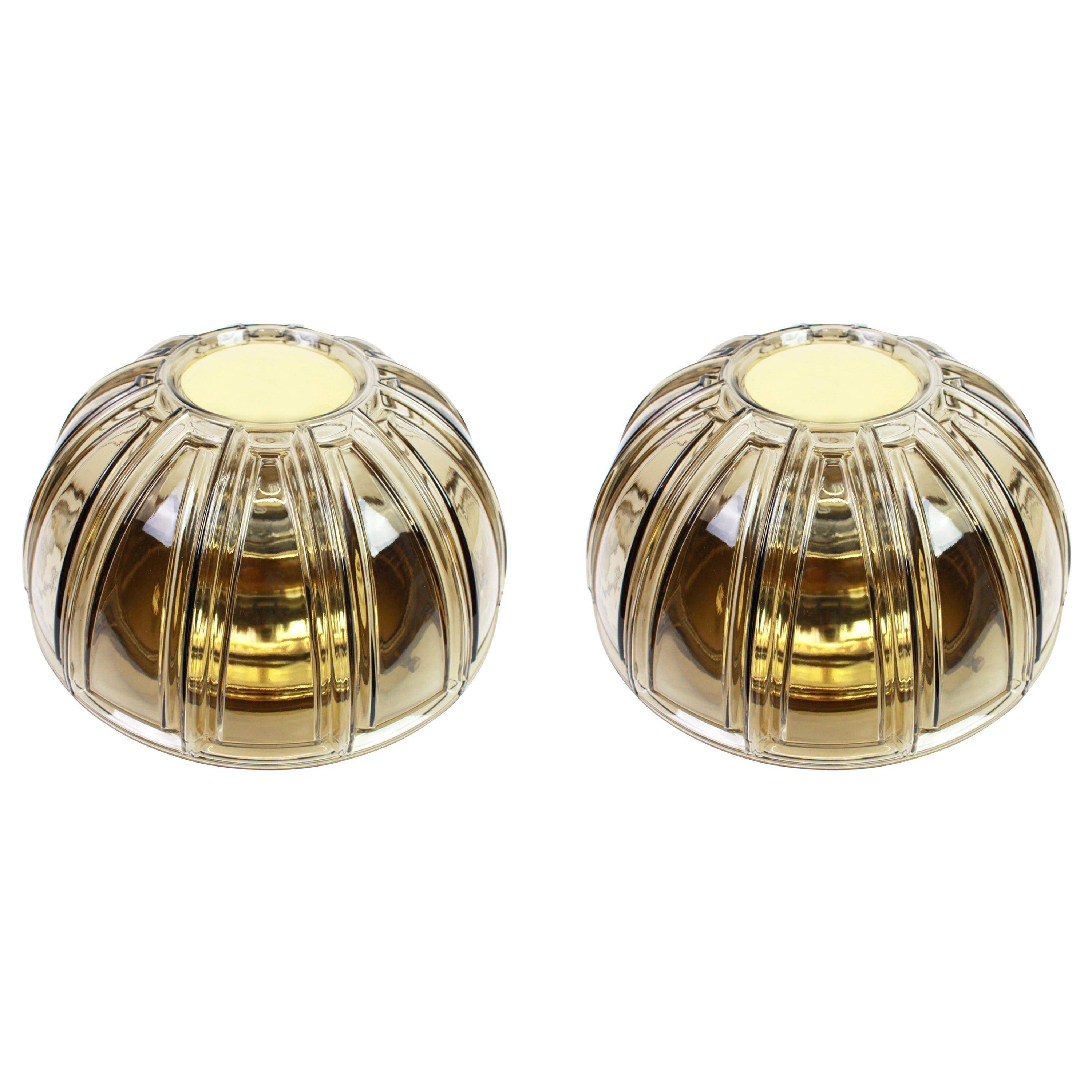 Pair of wall sconces in brass and amber glass by Limburg, Germany, 1960s.
