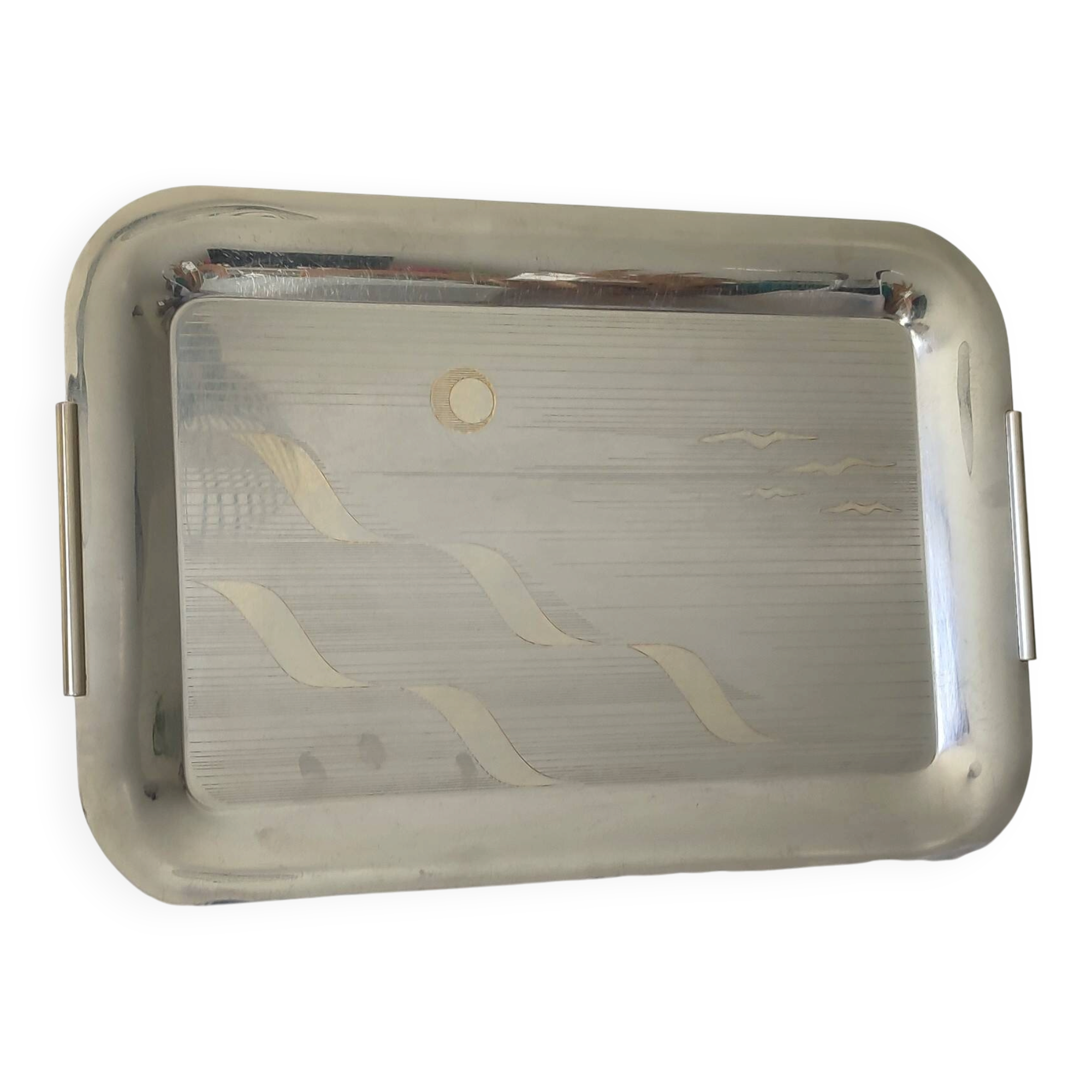 Vintage stainless steel serving platter with marine decor and golden handles.