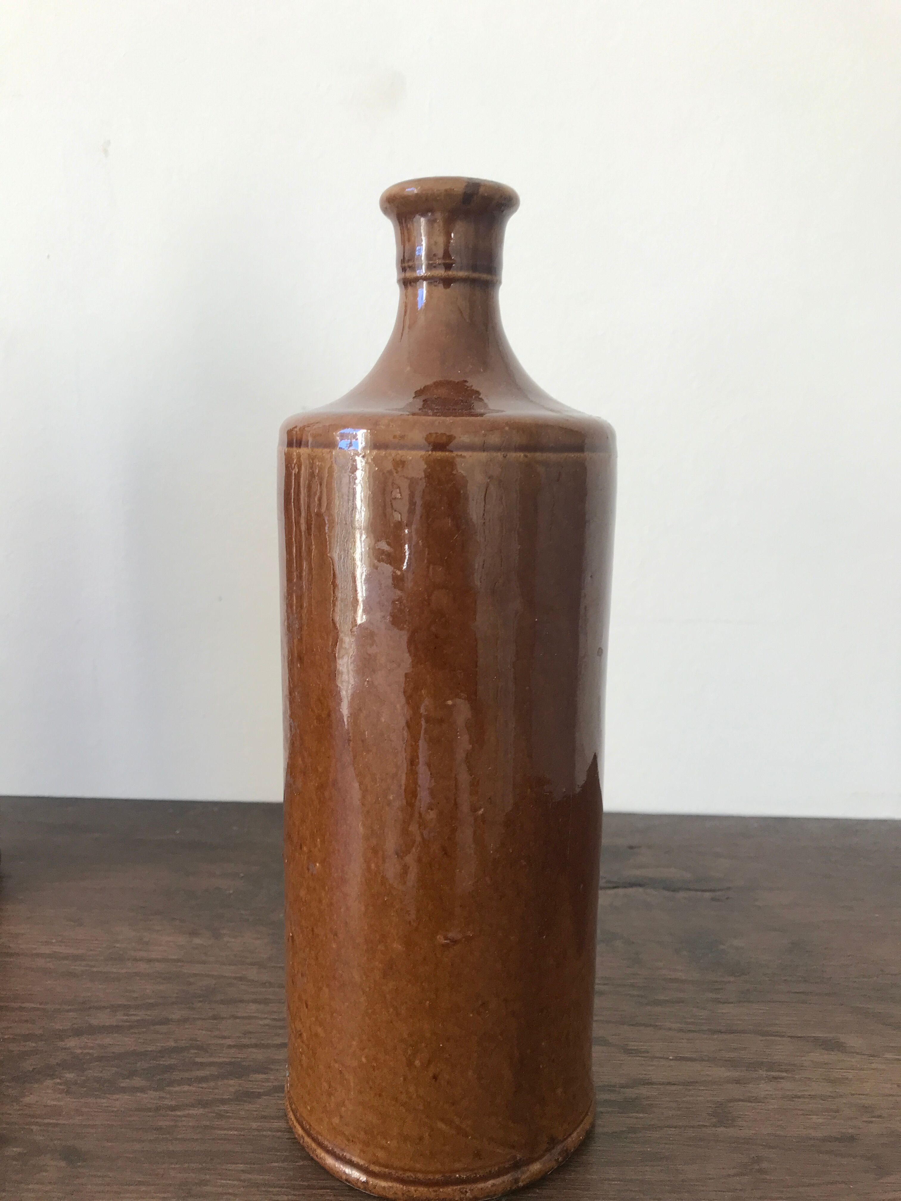 Pair of sandstone bottles