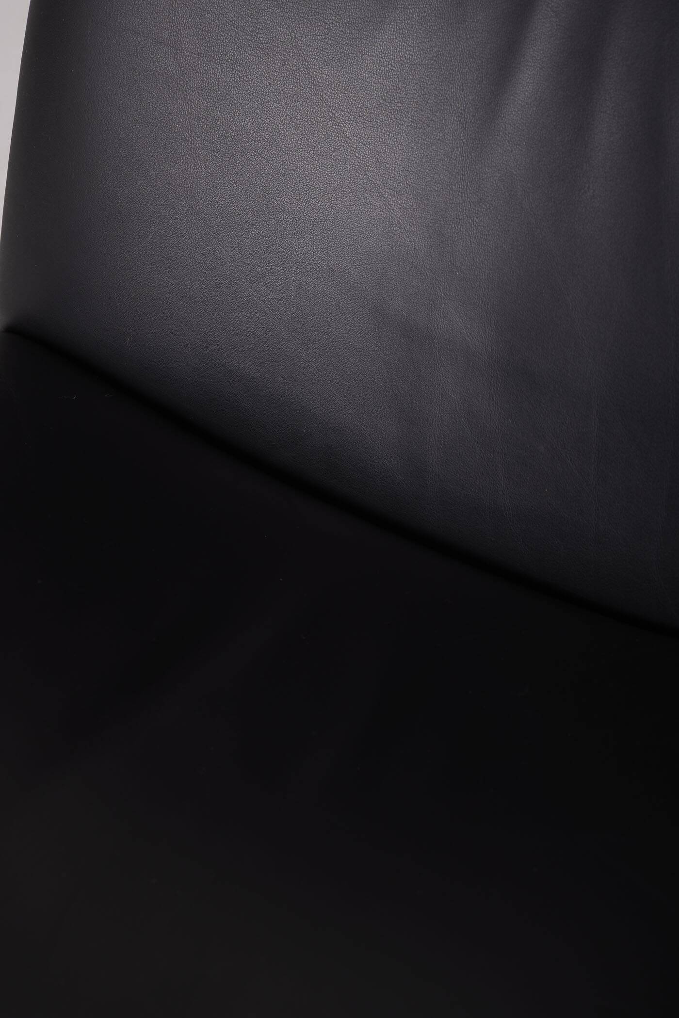 Geoffrey Harcourt black leather armchair