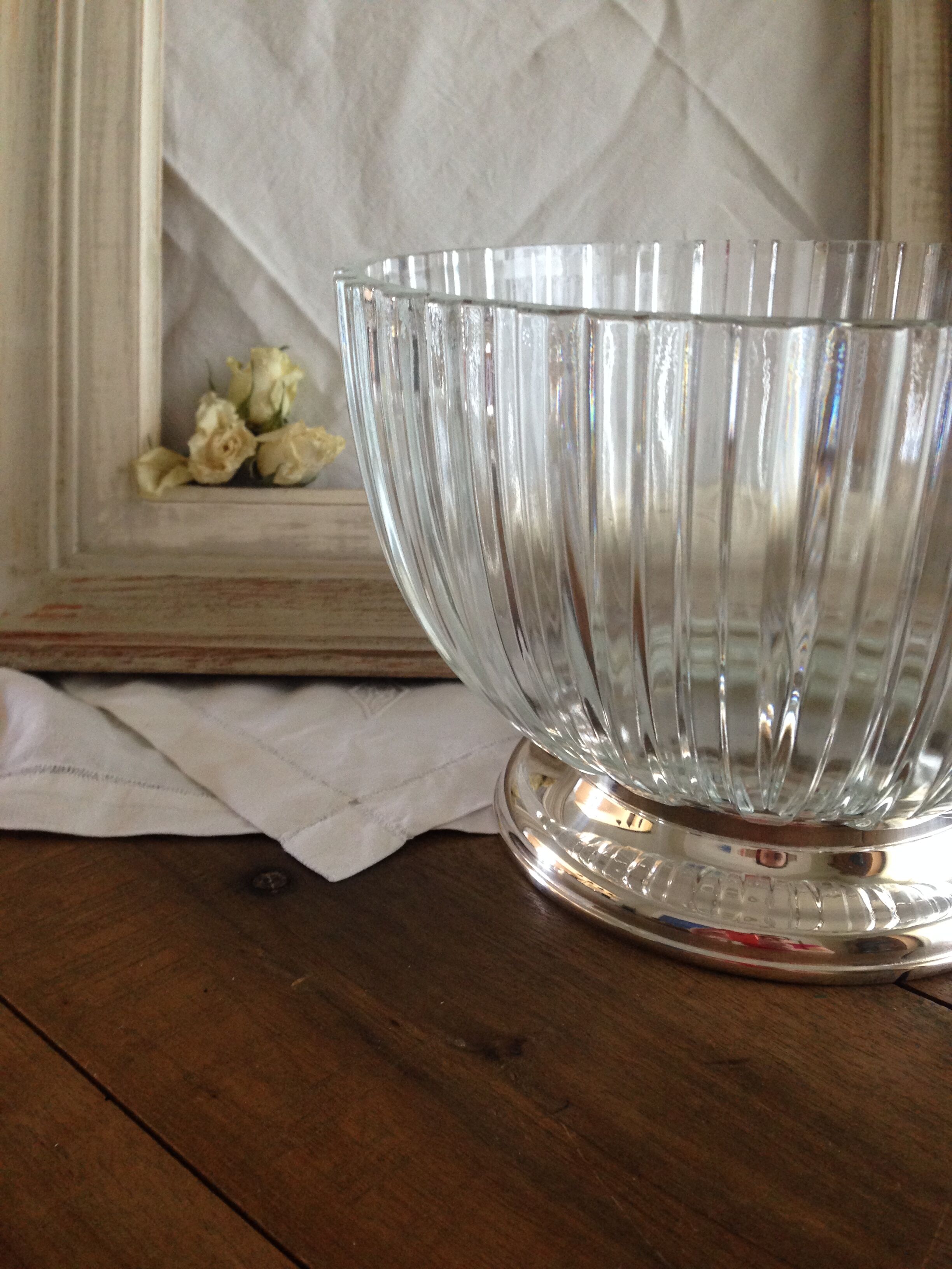 silver metal stand glass bowl