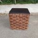 2 Scandinavian poufs in woven brown water hyacinth and leather