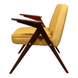 Fauteuil en bois et velours jaune par Chierowski