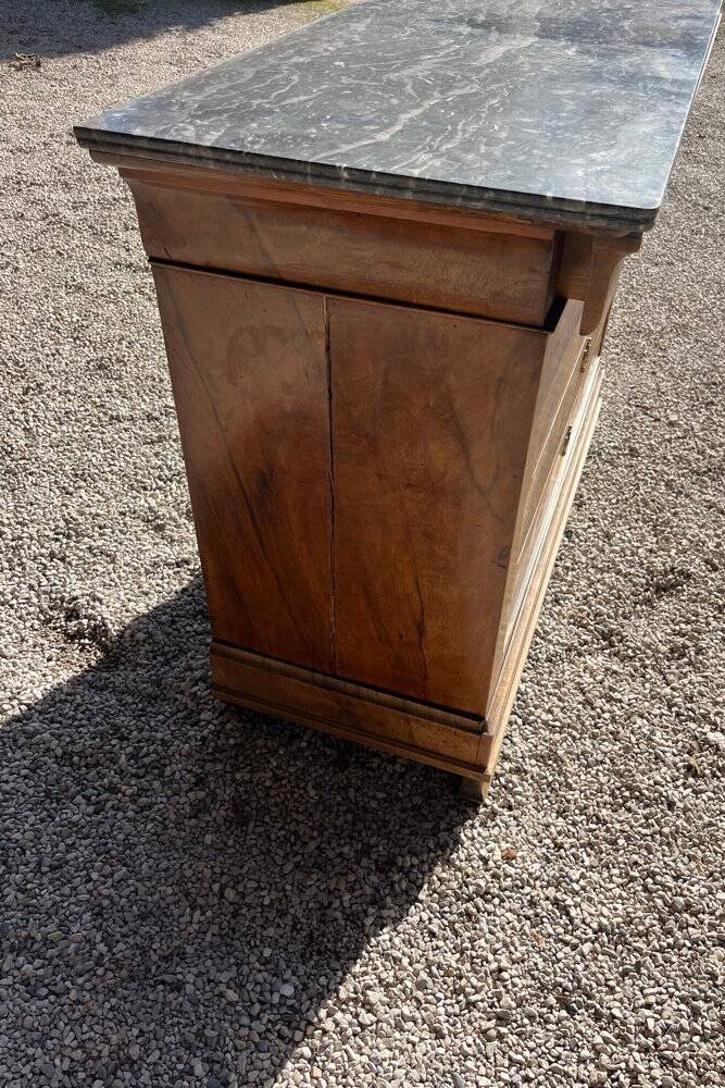 Antique chest of drawers with a grey marble top.