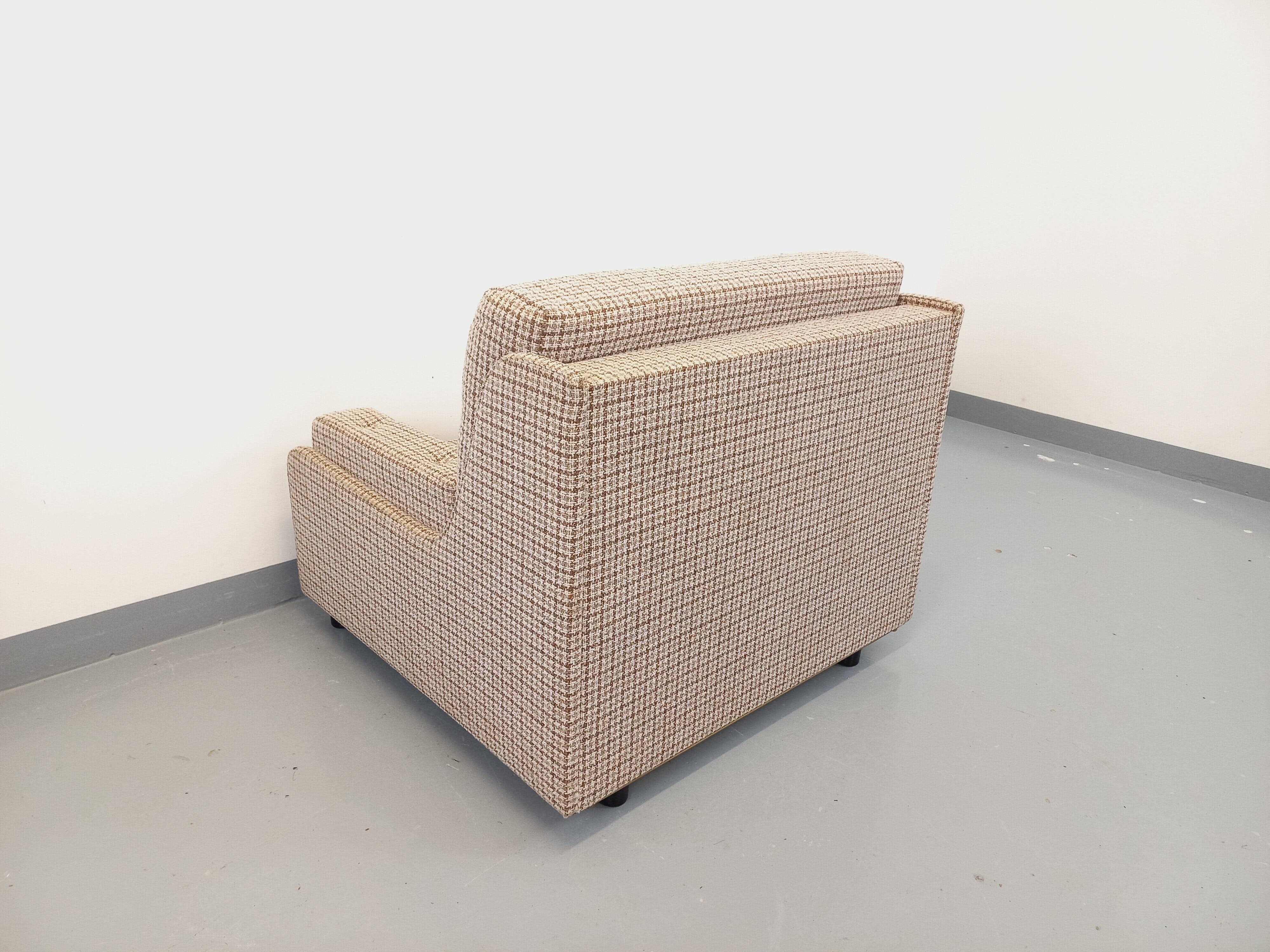 Vintage wool fabric armchair from the 1970s.